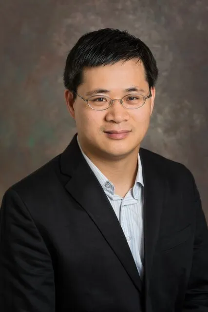 Guoquan Huang